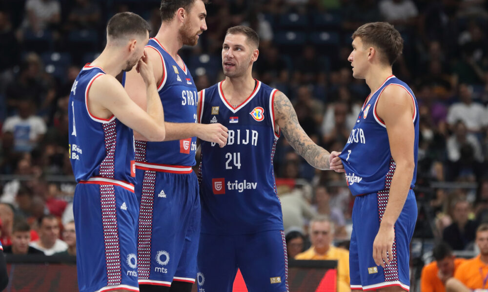 OGNJEN DOBRIC, NIKOLA MILUTINOV, STEFAN JOVIC, BOGDAN BOGDANOVIC RADOST kosarkasa reprezentacije Srbije na prijateljskoj utakmici pred FIBA Svetsko prvenstvo 2023 protiv Portorika u hali Stark Beogradska arena, Beograd 16.08.2023. godine Foto: Marko Metlas Kosarka, Srbija, Portoriko, Prijateljska utakmica