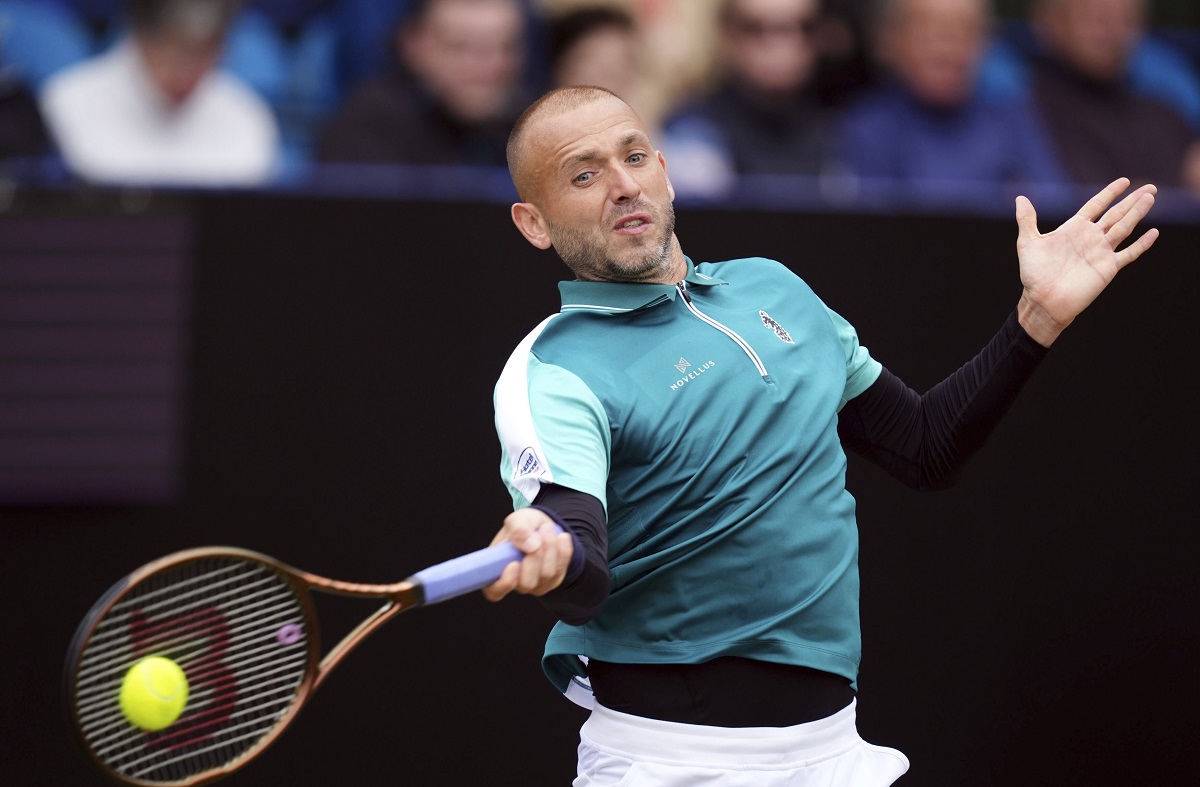 Daniel Evans returns the ball during his match against Jenson Brooksby on day four of the Eastbourne Open at Devonshire Park Lawn Tennis Club, Eastbourne, England, Thursday June 26, 2025. (John Walton/PA via AP)