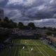 Dark clouds hover over the tennis courts at the Wimbledon Tennis Championships in London, Sunday, July 6, 2025.(AP Photo/Kirsty Wigglesworth)