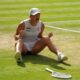 Iga Swiatek of Poland celebrates winning the women's singles final match against Amanda Anisimova of the U.S. at the Wimbledon Tennis Championships in London, Saturday, July 12, 2025.(AP Photo/Kirsty Wigglesworth)