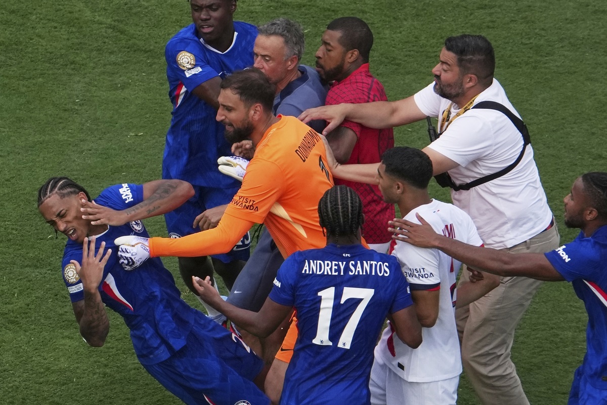 Chelsea's Joao Pedro (20) goes down after a scuffle after the Club World Cup final soccer match between Chelsea and PSG in East Rutherford, N.J., Sunday, July 13, 2025. (AP Photo/Matt Slocum)
