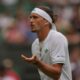 Alexander Zverev of Germany reacts as he plays Arthur Rinderknech of France during their first round men's singles match at the Wimbledon Tennis Championships in London, Tuesday, July 1, 2025. (AP Photo/Kin Cheung)