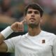 Spain's Carlos Alcaraz gestures as he plays Russia's Andrey Rublev during a fourth round men's singles match at the Wimbledon Tennis Championships in London, Sunday, July 6, 2025. (AP Photo/Alastair Grant)