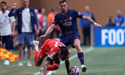 Bayern Munich's Michael Olise is fouled by Paris Saint-Germain's Fabian Ruiz during the Club World Cup quarterfinal soccer match between PSG and Bayern Munich in Atlanta, Saturday, July 5, 2025. (AP Photo/Mike Stewart)