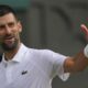 Serbia's Novak Djokovic gestures as he plays Italy's Flavio Cobolli during a quarterfinal men's singles match at the Wimbledon Tennis Championships in London, Wednesday, July 9, 2025. (AP Photo/Kin Cheung)