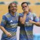 Real Madrid's Luka Modric, left, and Lucas Vazquez talk during a warmum for the Club World Cup round of 16 soccer match between Real Madrid and Juventus in Miami Gardens, Fla., Tuesday, July 1, 2025. (AP Photo/Rebecca Blackwell)