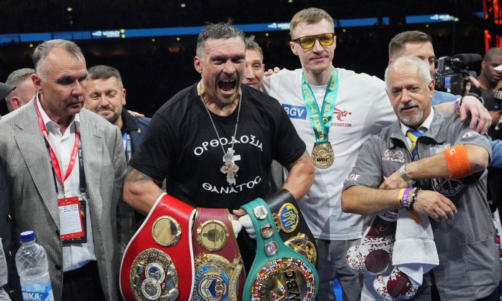 Ukraine's Oleksandr Usyk celebrates winning the undisputed world heavyweight boxing title fight against Britain's Daniel Dubois in London, Saturday, July 19, 2025. (AP Photo/Frank Augstein)