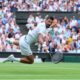 Novak Djokovic of Serbia dives to return to Miomir Kecmanovic of Serbia during a third round men's singles match at the Wimbledon Tennis Championships in London, Saturday, July 5, 2025. (AP Photo/Kirsty Wigglesworth)