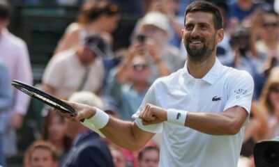 Novak Djokovic of Serbia reacts after beating Daniel Evans of Britain during their second round men's singles match at the Wimbledon Tennis Championships in London, Thursday, July 3, 2025. (AP Photo/Alastair Grant)