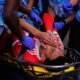 Bayern Munich's Jamal Musiala is taken off the field after an injury during the Club World Cup quarterfinal soccer match between PSG and Bayern Munich in Atlanta, Saturday, July 5, 2025. (AP Photo/Brynn Anderson)