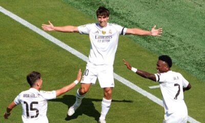 Real Madrid's Gonzalo Garcia, center, celebrates scoring his side's opening goal during the Club World Cup quarterfinal soccer match between Real Madrid and Borussia Dortmund in East Rutherford, N.J., Saturday, July 5, 2025. (AP Photo/Pamela Smith)