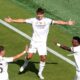 Real Madrid's Gonzalo Garcia, center, celebrates scoring his side's opening goal during the Club World Cup quarterfinal soccer match between Real Madrid and Borussia Dortmund in East Rutherford, N.J., Saturday, July 5, 2025. (AP Photo/Pamela Smith)