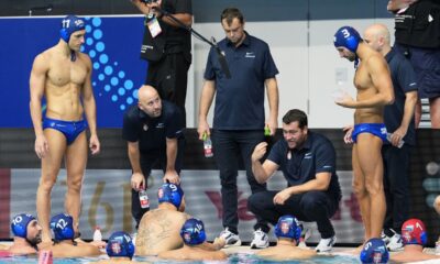 Serbia's head coach Uros Stevanovic talks to his players during the men's water polo bronze medal match against Greece at the World Aquatics Championships in Singapore, Thursday, July 24, 2025. (AP Photo/Vincent Thian)
