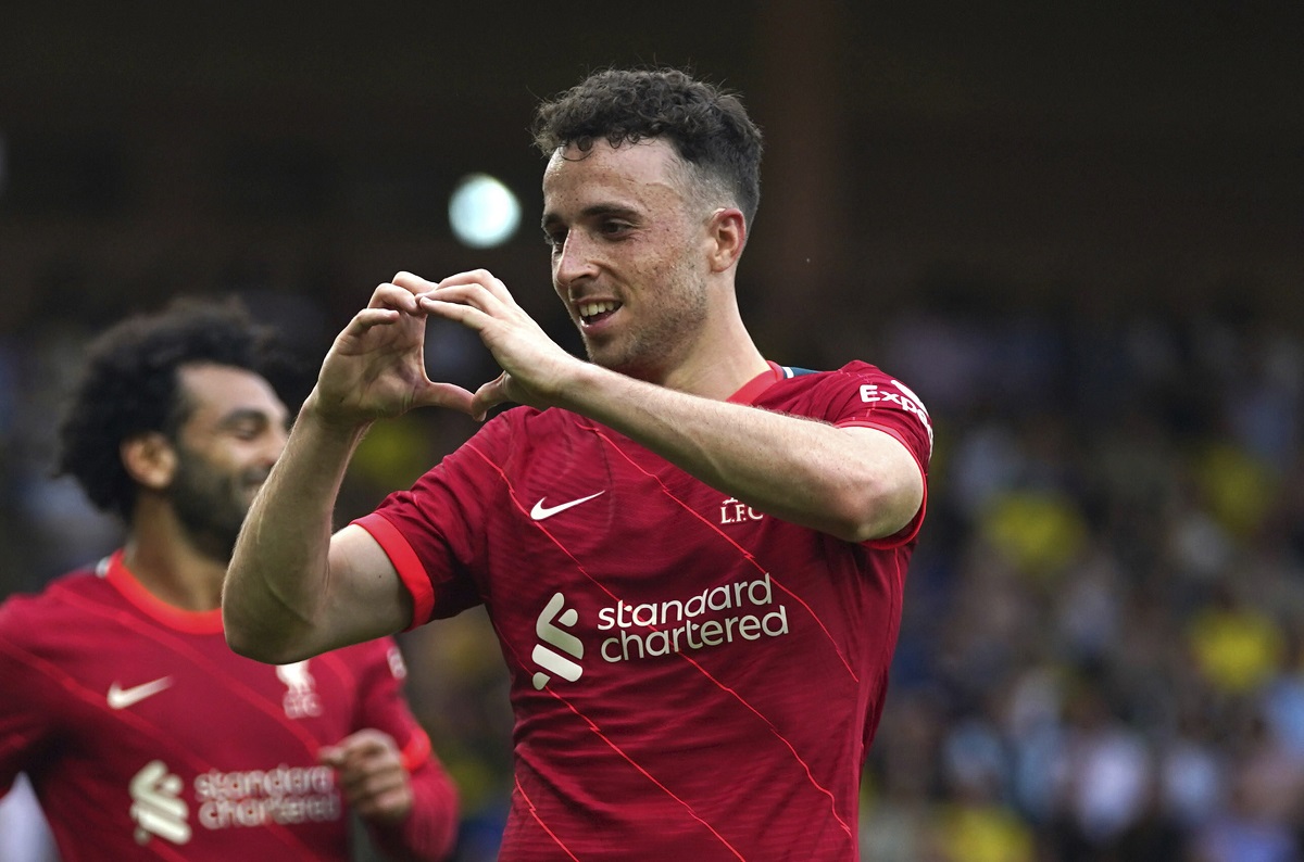 FILE - Liverpool's Diogo Jota celebrates scoring during the Premier League match at Carrow Road, Norwich, Saturday Aug. 14, 2021. (Joe Giddens/PA via AP, File)