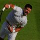 Serbia's Novak Djokovic serves to Italy's Flavio Cobolli during a quarterfinal men's singles match at the Wimbledon Tennis Championships in London, Wednesday, July 9, 2025. (AP Photo/Joanna Chan)