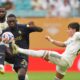 Juventus' Randal Kolo Muani, left, and Real Madrid's Fran Garcia fight for the ball during the Club World Cup round of 16 soccer match between Real Madrid and Juventus in Miami Gardens, Fla., Tuesday, July 1, 2025. (AP Photo/Rebecca Blackwell)