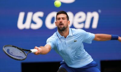 Novak Djokovic, of Serbia, returns a shot to Zachary Svajda, of the United States, during the second round of the U.S. Open tennis championships, Wednesday, Aug. 27, 2025, in New York. (AP Photo/Kirsty Wigglesworth)