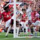 Arsenal's Riccardo Calafiori scores his sides first goal during the English Premier League soccer match between Manchester United and Arsenal at Old Trafford stadium in Manchester, England, Sunday, Aug. 17, 2025. (AP Photo/Dave Thompson)