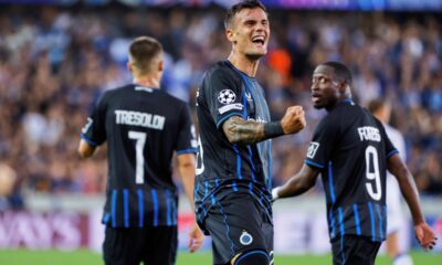 Brugge's Aleksandar Stankovic, center, celebrates after scoring his sides fourth goal during the Champions League play-off second leg soccer match between Rangers FC and Club Brugge at the Jan Breydel stadium in Bruges, Belgium, Wednesday, Aug. 27, 2025. (AP Photo/Omar Havana)