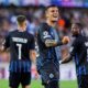 Brugge's Aleksandar Stankovic, center, celebrates after scoring his sides fourth goal during the Champions League play-off second leg soccer match between Rangers FC and Club Brugge at the Jan Breydel stadium in Bruges, Belgium, Wednesday, Aug. 27, 2025. (AP Photo/Omar Havana)