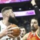 Jonas Valanciunas of Lithuania and Jonas Vucevic of Montenegro during the Eurobasket, European Basketball Championship group B match between Lithuania and Montenegro in Tampere, Finland, Friday, Aug. 29, 2025. (Heikki Saukkomaa/Lehtikuva via AP)