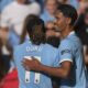 Manchester City's Tijjani Reijnders, right, celebrates with Manchester City's Jeremy Doku after scoring his sides second goal during the English Premier League soccer match between Wolverhampton Wanderers and Manchester City at Molineux Stadium, Wolverhampton, England, Saturday, Aug. 16, 2025. (AP Photo/Dave Shopland)