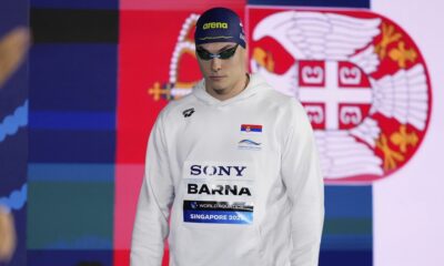 Andrej Barna of Serbia arrives to compete in the men's 50-meter freestyle semifinals at the World Aquatics Championships in Singapore, Friday, Aug.1, 2025. (AP Photo/Vincent Thian)