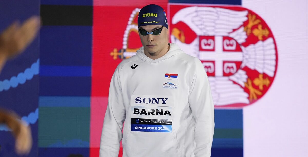 Andrej Barna of Serbia arrives to compete in the men's 50-meter freestyle semifinals at the World Aquatics Championships in Singapore, Friday, Aug.1, 2025. (AP Photo/Vincent Thian)