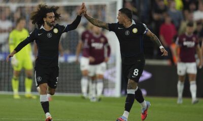 Chelsea's Marc Cucurella, left, and Enzo Fernandez celebrate after a goal during the Premier League soccer match between Chelsea and West Ham in London, Friday, Aug. 22, 2025. (AP Photo/Dave Shopland)