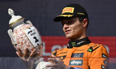 McLaren driver Lando Norris of Britain celebrates on the podium after winning the Hungarian Formula One Grand Prix race at the Hungaroring racetrack in Mogyorod, Hungary, Sunday, Aug. 3, 2025. (AP Photo/Denes Erdos)