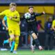Bodo Glimt's Jens Petter Hauge, left, Sturm Grazs Otar Kiteishvili battle for the ball during a UEFA Champions Leauge soccer match, Wednesday, Aug. 20, 205, in Bodo, Norway. (Mats Torbergsen/NTB Scanpix via AP)