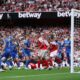 Arsenal's Jurrien Timber, at left on the ground, scores the opening goal during the English Premier League soccer match between Arsenal and Leeds United at Emirates stadium in London, England, Saturday, Aug. 23, 2025. (AP Photo/Ian Walton)