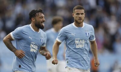 Malmö's Sead Hakšabanović, left, celebrates after scoring a goal during the Champions League qualifying round soccer match between Sweden's Malmö FF and Latvia's RFS, Wednesday, July 30, 2025, in Malmö, Sweden,. (Andreas Hillergren/TT News Agency via AP)